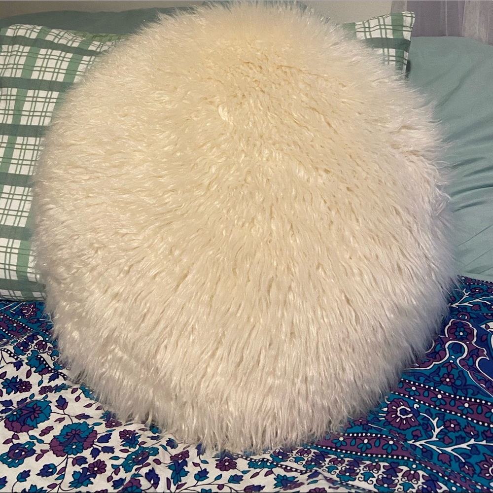 Cream throw pillow